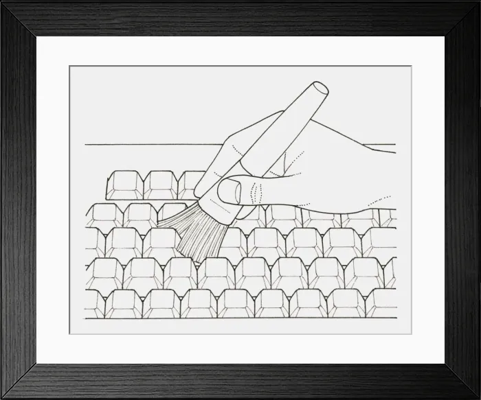 Framed Print : Black and white illustration of a hand cleaning a keyboard with a brush Framed Print : Black and white illustration of a hand cleaning a keyboard with a brush