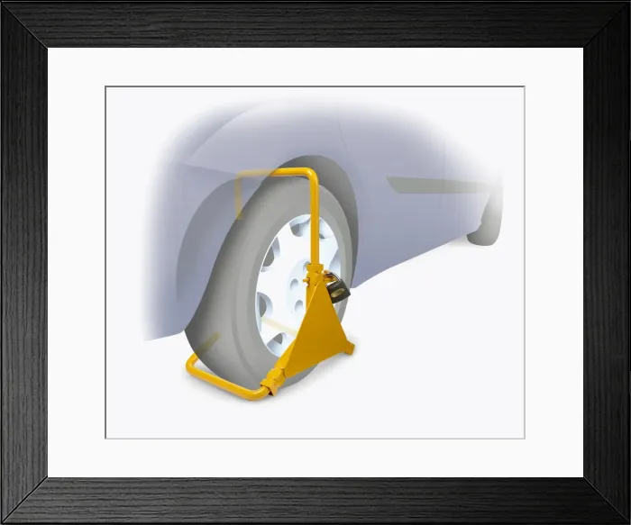 Framed Print : Wheel clamp on a car Framed Print : Wheel clamp on a car