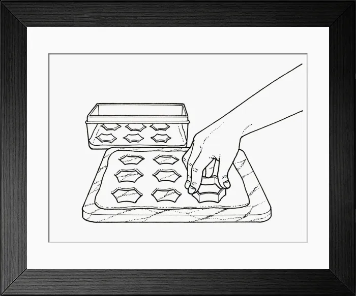 Framed Print : Black and white illustration using pastry cutter to cut shapes from pastry on chopping board Framed Print : Black and white illustration using pastry cutter to cut shapes from pastry on chopping board
