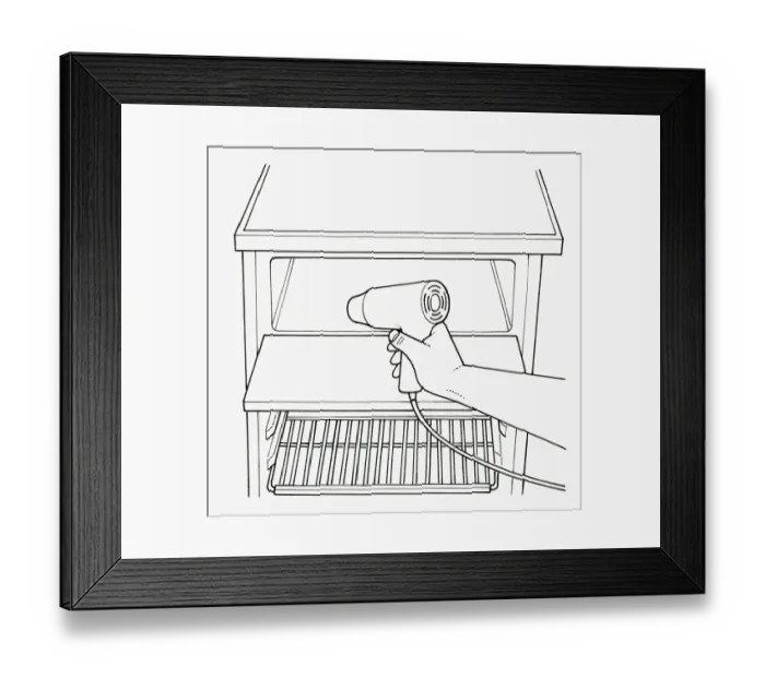 Framed Print : Black and white illustration of defrosting refrigerator freezer compartment using hair dryer