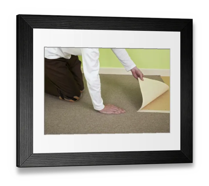 Framed Print : Man installing carpet tiles on top of plywood floor Framed Print : Man installing carpet tiles on top of plywood floor