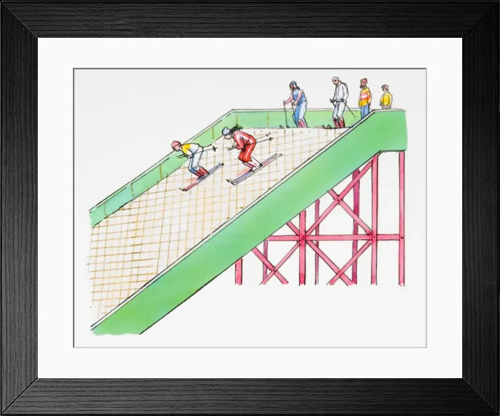 Framed Print : Skiers descending down artificial slope