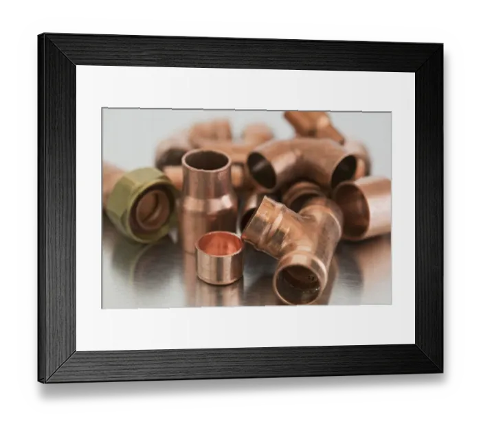 Framed Print : Copper pipe connectors Framed Print : Copper pipe connectors