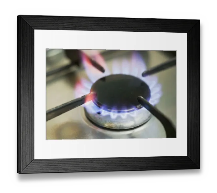 Framed Print : Gas cooker hob, close up of one ring lit up Framed Print : Gas cooker hob, close up of one ring lit up