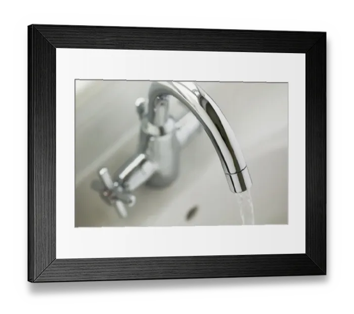 Framed Print : A running tap, view from above Framed Print : A running tap, view from above