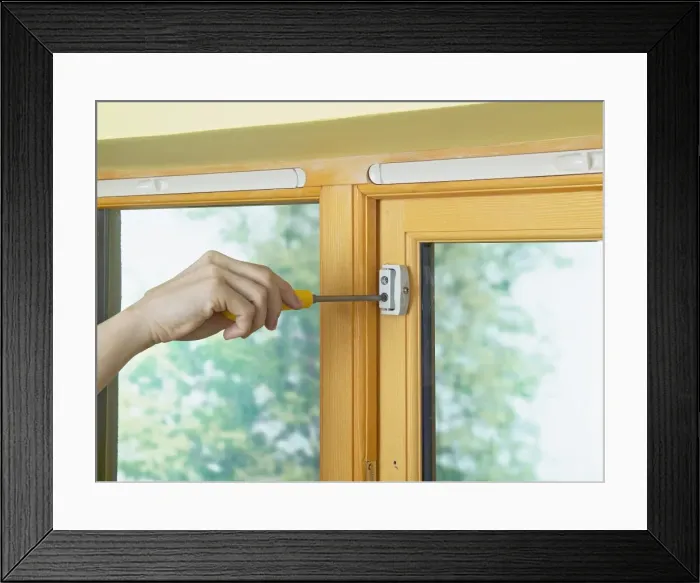 Framed Print : Screwing locking body in to place Framed Print : Screwing locking body in to place