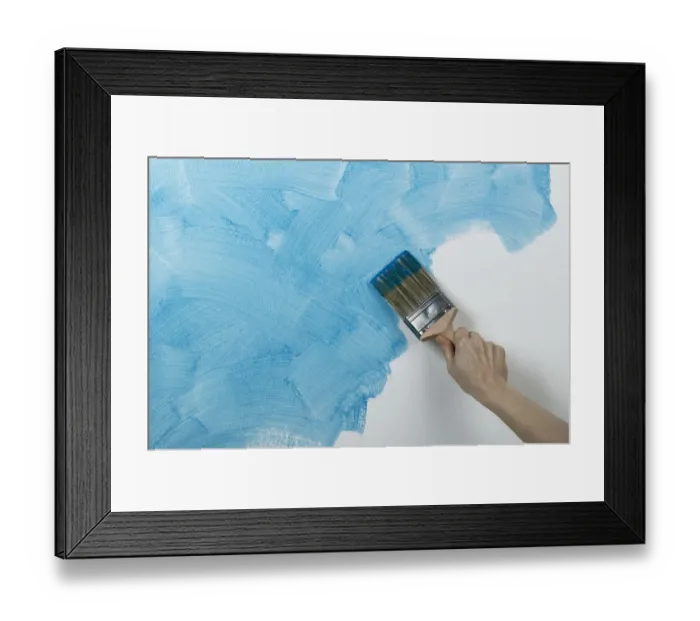 Framed Print : Person painting glaze onto wall with brush Framed Print : Person painting glaze onto wall with brush