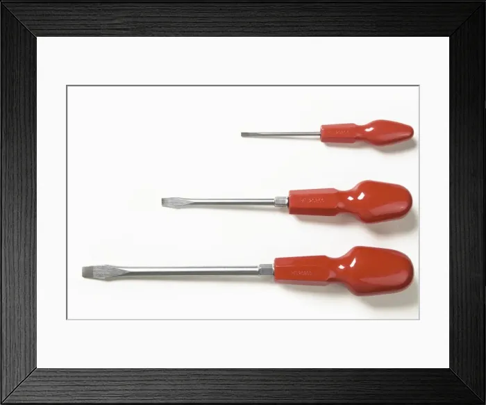 Framed Print : Three orange handled slot-headed screwdrivers Framed Print : Three orange handled slot-headed screwdrivers