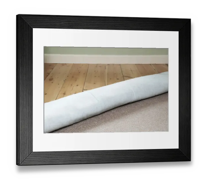 Framed Print : Carpet rolled back to reveal floorboards Framed Print : Carpet rolled back to reveal floorboards