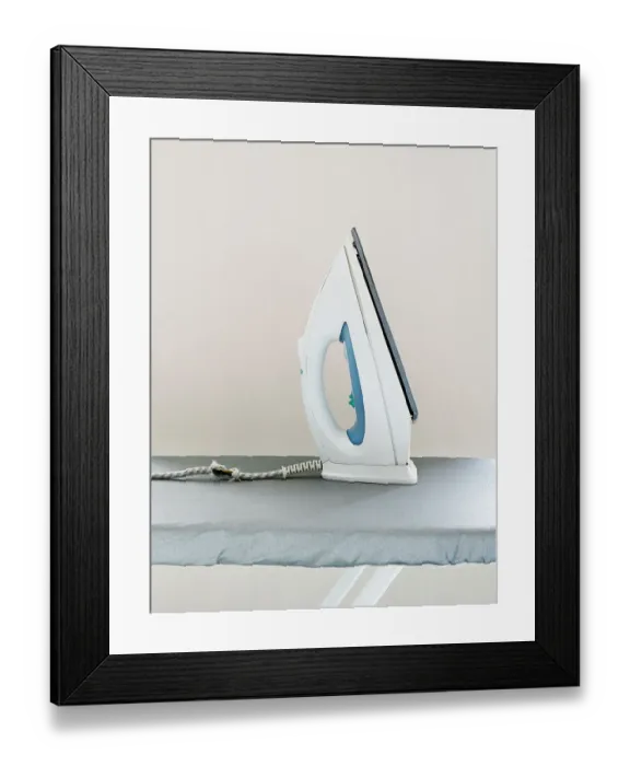 Framed Print : Iron on ironing board Framed Print : Iron on ironing board