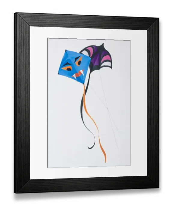 Framed Print : Kite fighting, two colourful kites flying with their lines crossing Framed Print : Kite fighting, two colourful kites flying with their lines crossing