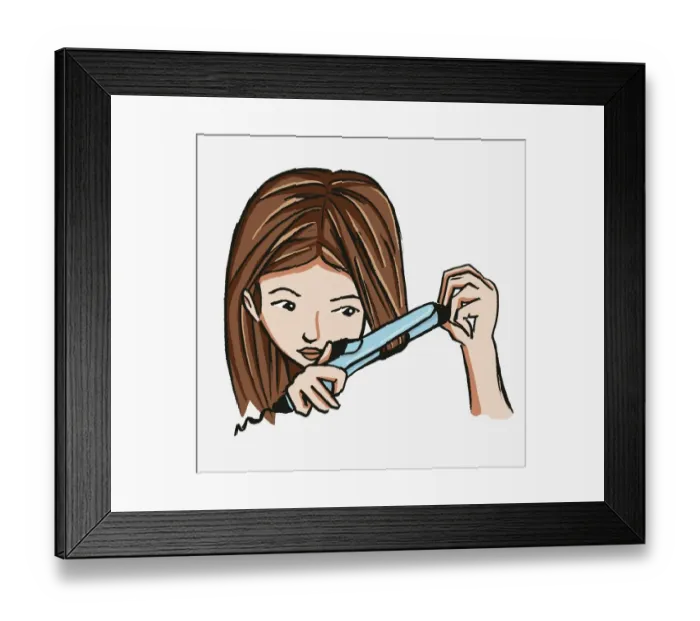 Framed Print : Head of girl with long, straight brown hair wrapping front strands around barrel of curling iron Framed Print : Head of girl with long, straight brown hair wrapping front strands around barrel of curling iron