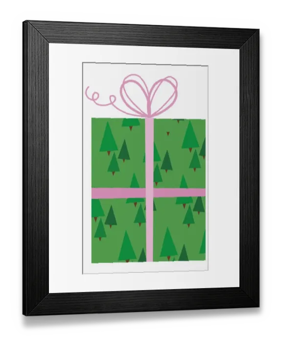 Framed Print : Present with tree pattern wrapping paper and pink bow at the top Framed Print : Present with tree pattern wrapping paper and pink bow at the top