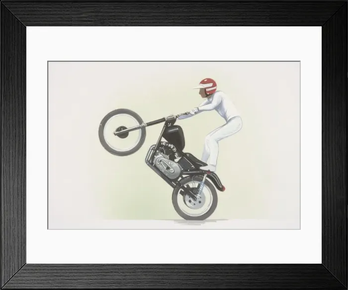 Framed Print : Stunt rider standing on motorbike, front wheel raised, side view Framed Print : Stunt rider standing on motorbike, front wheel raised, side view