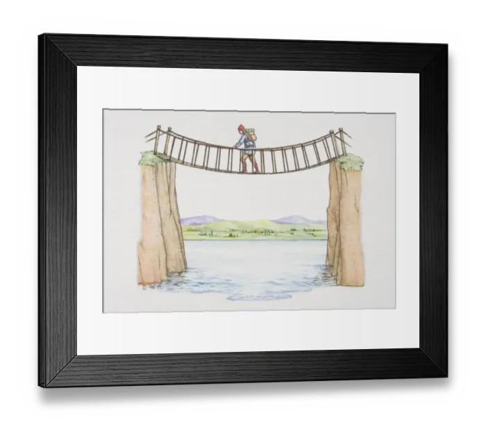 Framed Print : Man crossing rope bridge spanning river, mountain landscape in background Framed Print : Man crossing rope bridge spanning river, mountain landscape in background