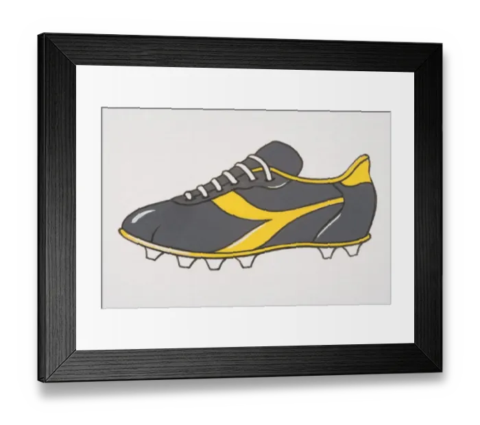 Framed Print : Grey and yellow football boot, side view Framed Print : Grey and yellow football boot, side view