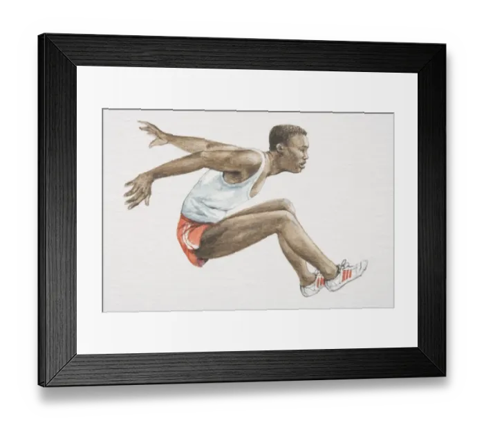 Framed Print : Man in red shorts, white vest and trainers leaping forwards with legs stretched in front of him and arms behind his back, side view
