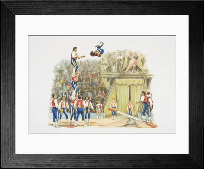 Framed Print : Acrobats performing in circus ring, jumping on springboard to form human pyramid, audience in background Framed Print : Acrobats performing in circus ring, jumping on springboard to form human pyramid, audience in background
