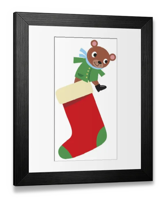 Framed Print : Teddy bear stepping out of red Christmas stocking