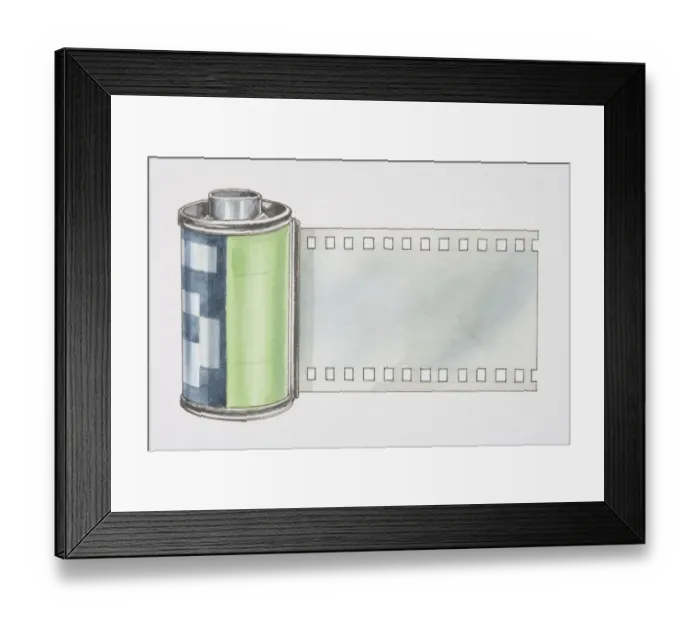 Framed Print : Edge of 35mm film roll extending out of its plastic case Framed Print : Edge of 35mm film roll extending out of its plastic case