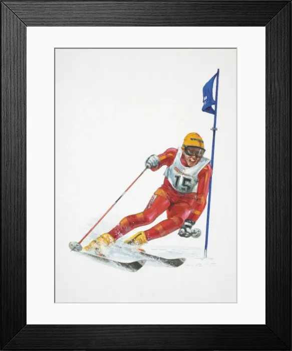 Framed Print : Man skiing around slalom flag, front view Framed Print : Man skiing around slalom flag, front view