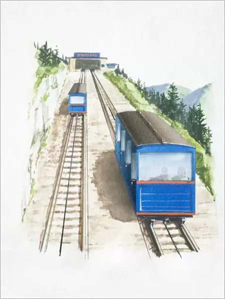 Two railway cars being pulled up a steep slope