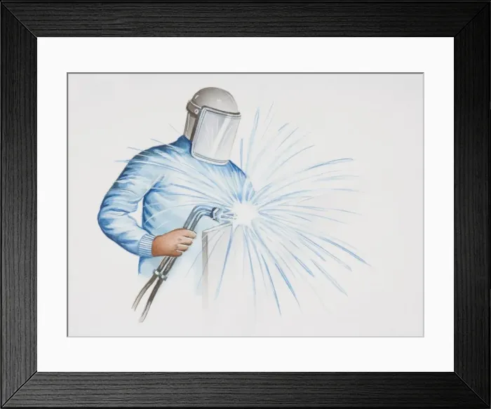 Framed Print : Man in protective gear using a welding machine Framed Print : Man in protective gear using a welding machine