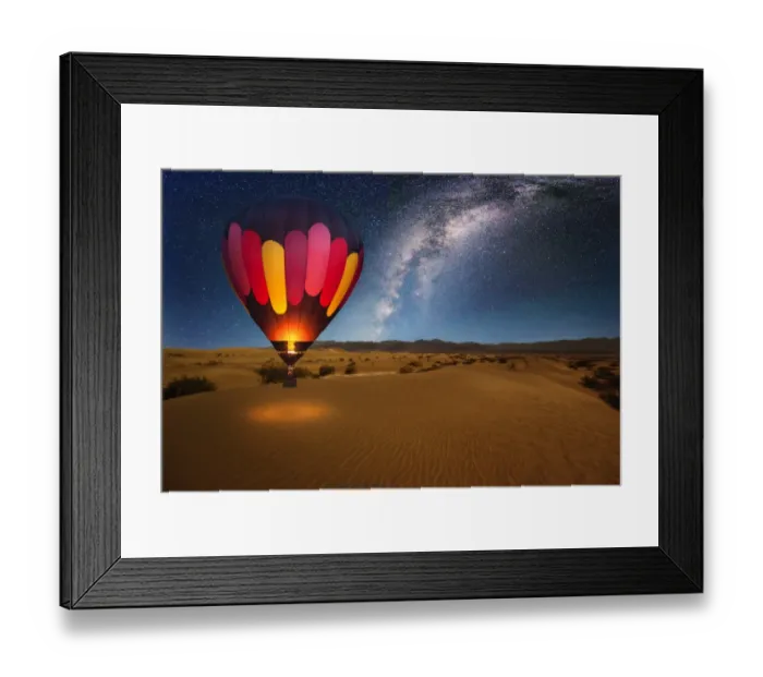 Framed Print : A majestic hot air balloon soars under the stars of the Milky Way, over the desert - Mesquite Dunes of Death Valley National Park. Moonlight provides luminosity showing the patterns and shapes of the desert landscape Framed Print : A majestic hot air balloon soars under the stars of the Milky Way, over the desert - Mesquite Dunes of Death Valley National Park. Moonlight provides luminosity showing the patterns and shapes of the desert landscape