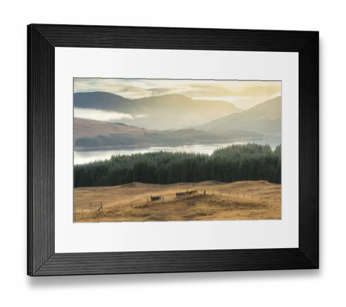 Framed Print : Dramatic sunset with atmospheric clouds over the mountainous Scottish landscape