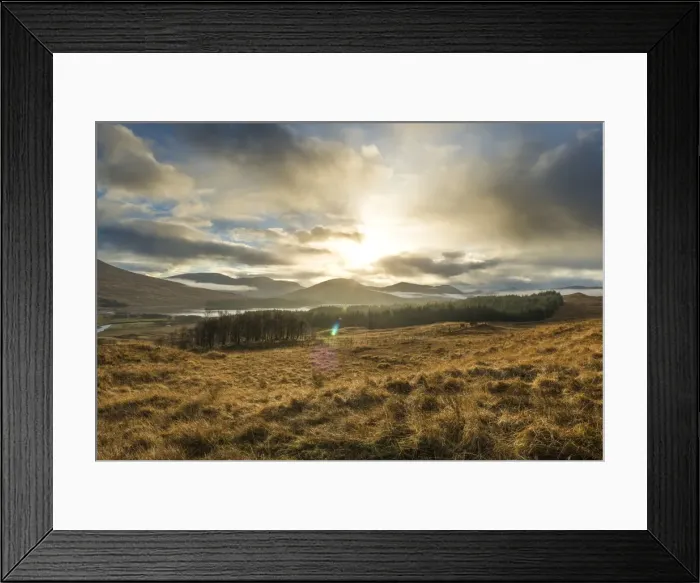Framed Print : Dramatic sunset with atmospheric clouds over the mountainous Scottish landscape