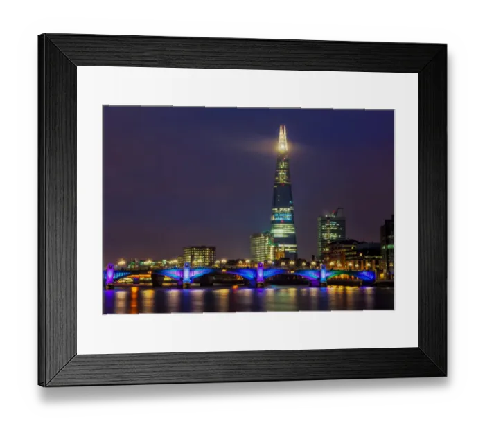 Framed Print : London. towers over the colourful Southwark Bridge Framed Print : London. towers over the colourful Southwark Bridge
