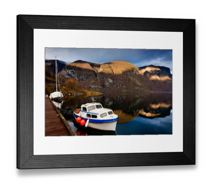 Framed Print : Fjord in spotlight with boats in river