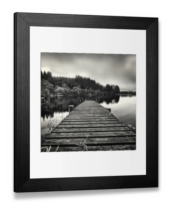 Framed Print : Out Reach. Wooden jetty leading out to boat house.Loch Ard Scotland Framed Print : Out Reach. Wooden jetty leading out to boat house.Loch Ard Scotland