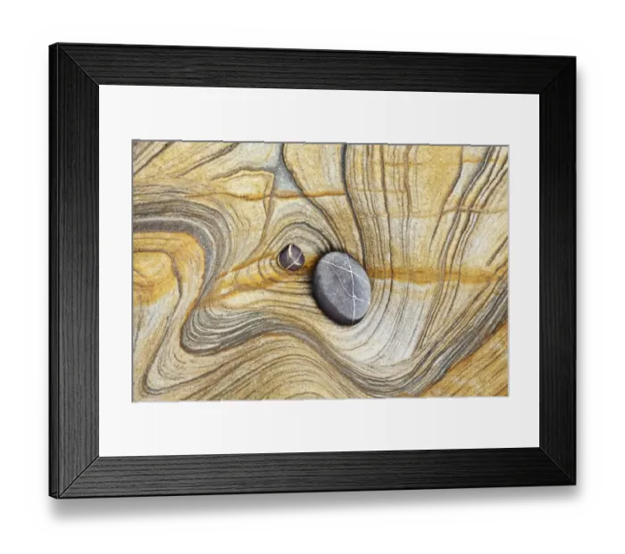 Framed Print : Creation. Natural patterns and shapes made in the rocks by the continuing Framed Print : Creation. Natural patterns and shapes made in the rocks by the continuing