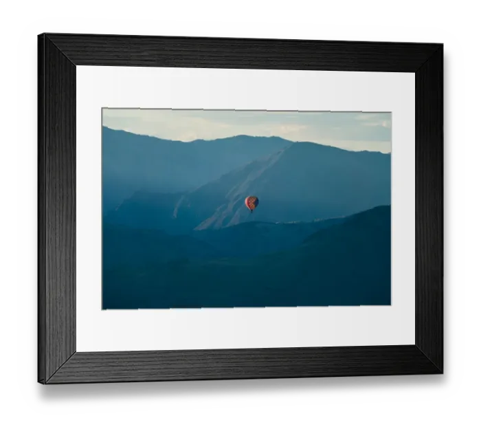 Framed Print : Hot air balloon flying over mountain range at Queenstown Framed Print : Hot air balloon flying over mountain range at Queenstown