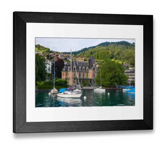 Framed Print : Sailing boats and village beside lake Thun Framed Print : Sailing boats and village beside lake Thun