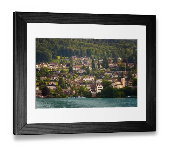 Framed Print : The village and landscape beside lake Thun, Switzer