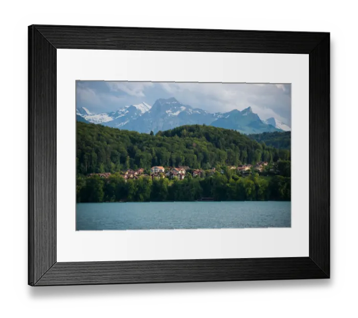 Framed Print : The village and landscape beside lake Thun, Switzer