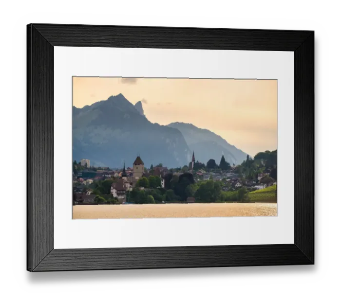 Framed Print : The village locates beside lake Thun, Switzerland Framed Print : The village locates beside lake Thun, Switzerland