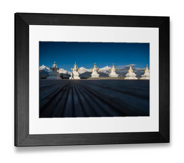 Framed Print : Tibetan stupas and the snow mountain