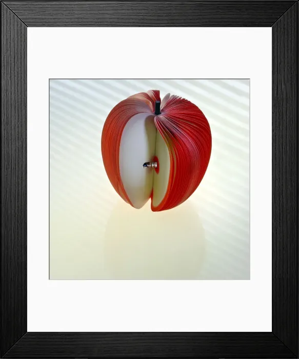 Framed Print : book worm. A real, live meal worm is seen emerging Framed Print : book worm. A real, live meal worm is seen emerging