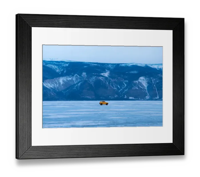 Framed Print : A yellow car on the frozen Baikal lake Framed Print : A yellow car on the frozen Baikal lake