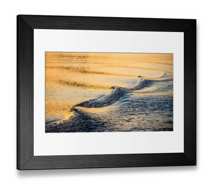 Framed Print : A closeup of a wave and wake in the refelcted suns Framed Print : A closeup of a wave and wake in the refelcted suns
