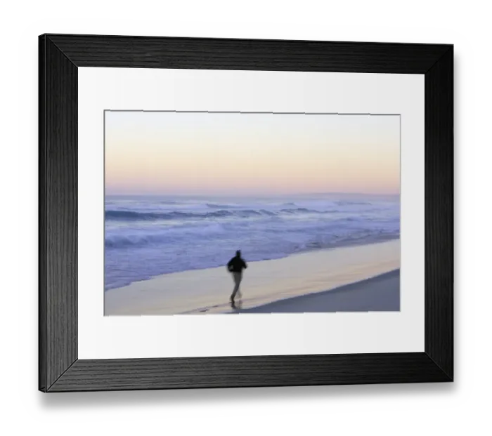 Framed Print : Man running on beach, dawn, (blurred motion) Framed Print : Man running on beach, dawn, (blurred motion)