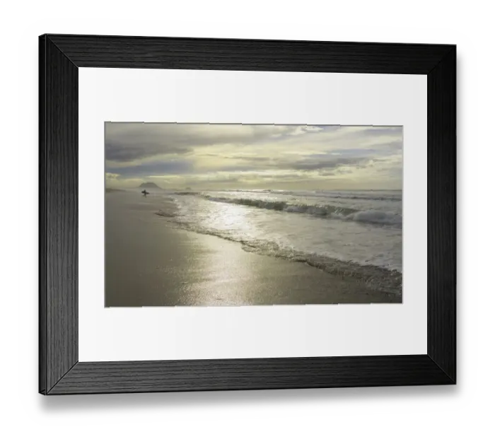 Framed Print : Person carrying surfboard on beach Framed Print : Person carrying surfboard on beach