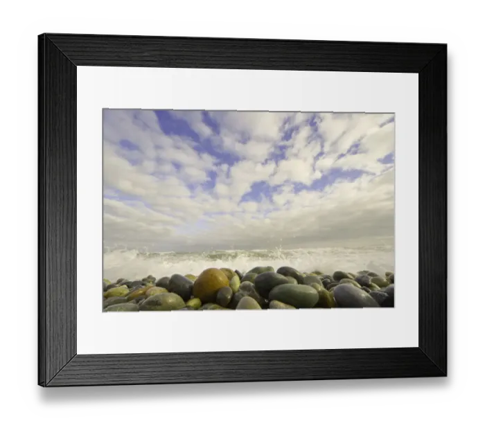Framed Print : Rocky beach with waves breaking in background Framed Print : Rocky beach with waves breaking in background