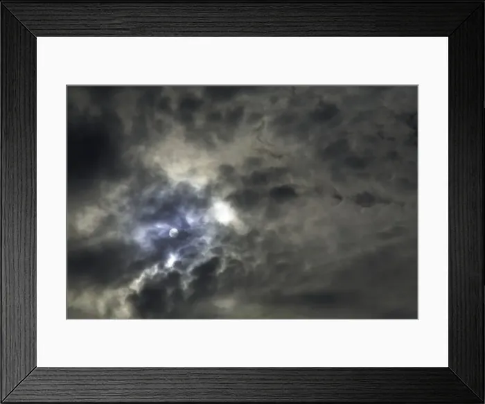 Framed Print : Sun behind layer of cloud, low angle view Framed Print : Sun behind layer of cloud, low angle view