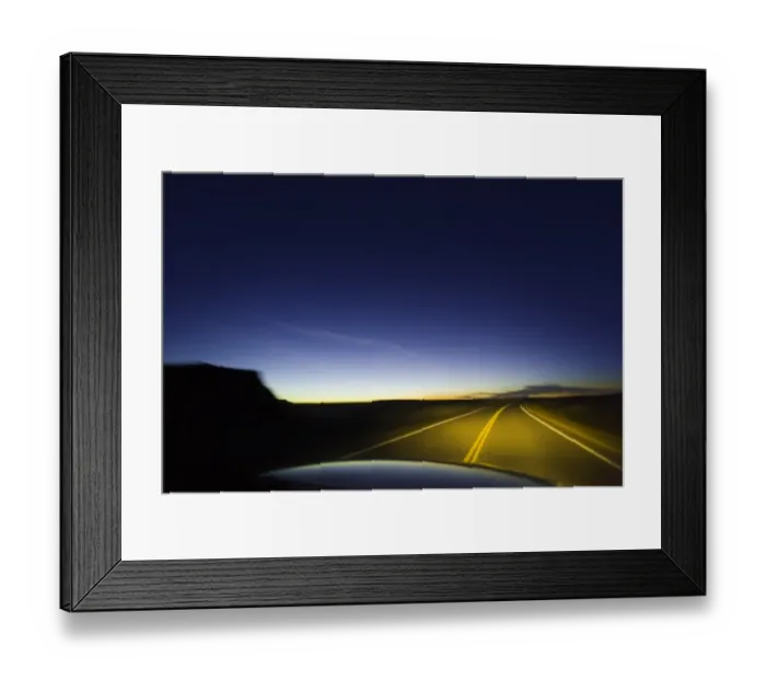 Framed Print : Road past sandstone buttes, lit by headlights, night (blurred motion)