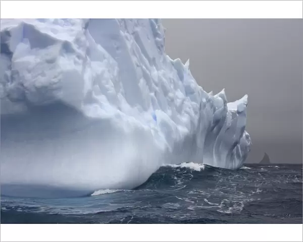Iceberg and sea waves, South Georgia Island