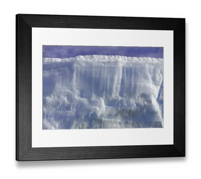 Framed Print : Massive iceberg with layers of blue ice Framed Print : Massive iceberg with layers of blue ice